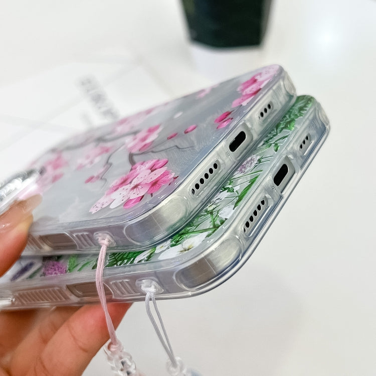 For iPhone 16e Electroplating Flowers Plants Texture Wristband TPU Phone Case(Peach Blossom FL18) - iPhone 16e Cases by PMC TechLife | Online Shopping South Africa | PMC TechLife | Buy Now Pay Later Mobicred