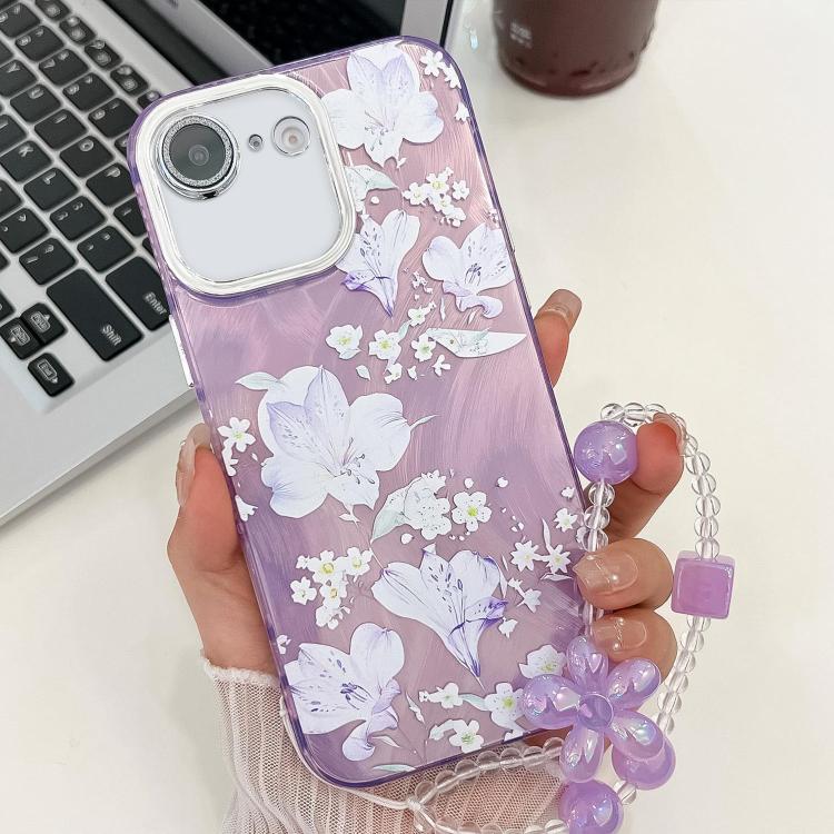 For iPhone 16e Electroplating Flowers Plants Texture Wristband TPU Phone Case(Pale Purple FlowerFL11) - iPhone 16e Cases by PMC TechLife | Online Shopping South Africa | PMC TechLife | Buy Now Pay Later Mobicred