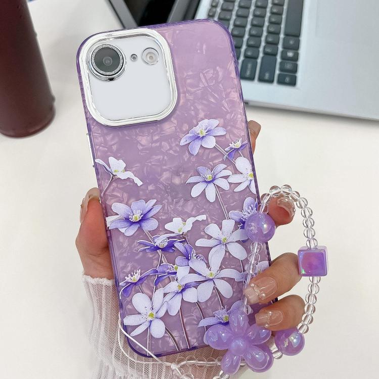 For iPhone 16e Electroplating Flowers Plants Texture Wristband TPU Phone Case(Lilac Flowers FL16) - iPhone 16e Cases by PMC TechLife | Online Shopping South Africa | PMC TechLife | Buy Now Pay Later Mobicred